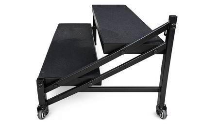 LimeLight 2 step stage stair system with dual height design, steel construction, and handrails for safe access to portable stage platforms with wheel detail. Ideal for schools, churches, and event staging.