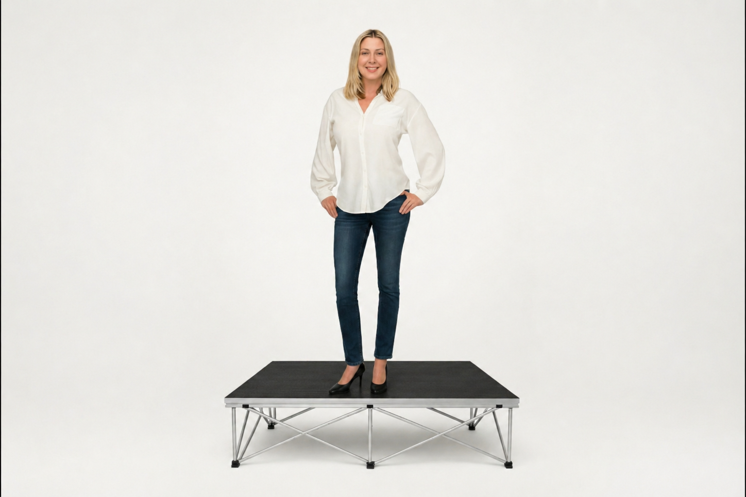 Woman standing on LimeLight portable stage platform and riser combination, 8 inches high, with black HexCoat finish.