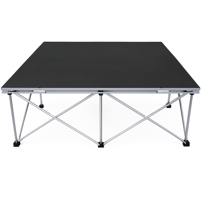 LimeLight Lite Series 4x4 stage riser in Black HexCoat Laminate at 24" height. Ideal for schools, churches, and event professionals.