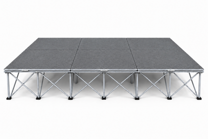 LimeLight Stages 12' x 8' portable stage, 16 inches high, with gray carpet finish.