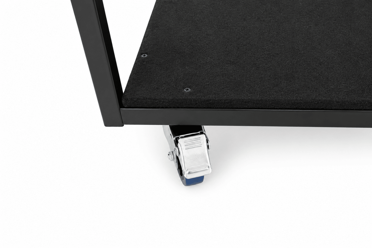 LimeLight stage cart caster with brake for secure positioning during loading and storage.