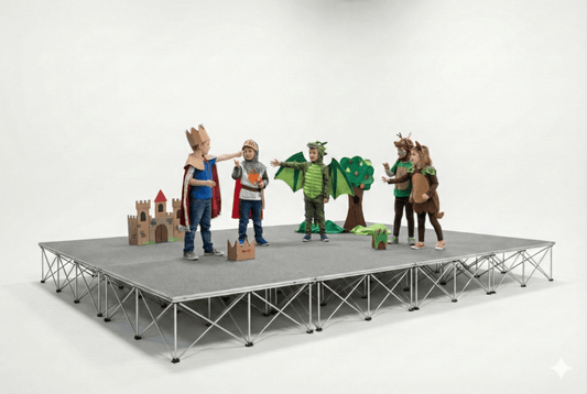Children in costumes with props on a LimeLight Lite Series 16x12 modular stage platform in Grey Carpet at 16" height. Ideal for schools, churches, and event professionals.