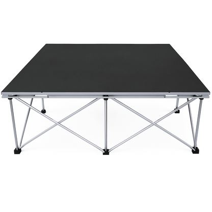LimeLight Lite Series 4x4 stage riser in Black HexCoat Laminate at 24" height. Ideal for schools, churches, and event professionals.